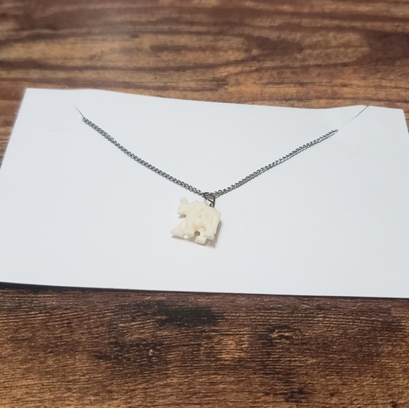 silver tone necklace with cream elephant pendant - Picture 5 of 5